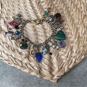 Handmade almost full charm bracelet with vintage and modern pendants